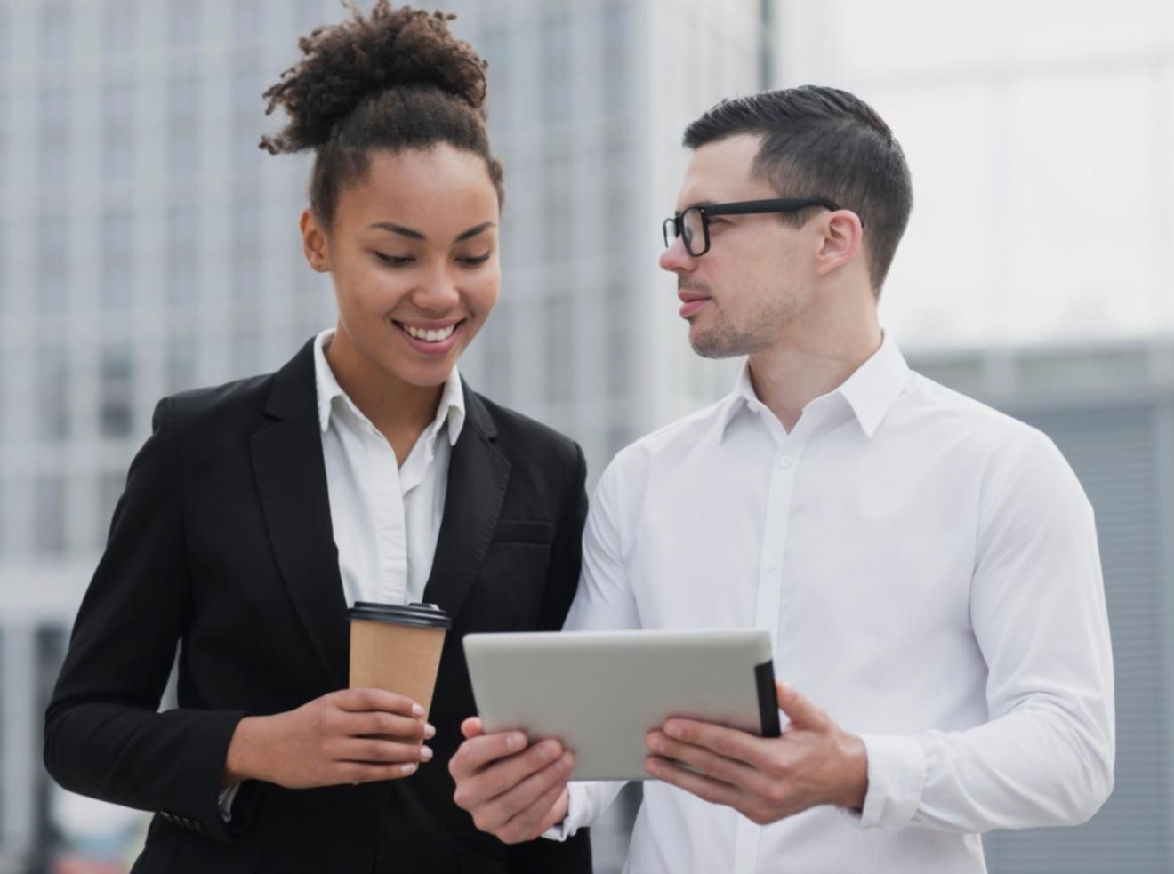 Professional team reviewing budget documents in modern office setting